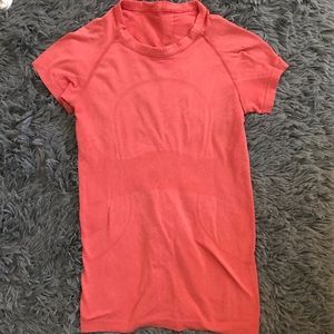 Pink peach colored lululemon shirt!!